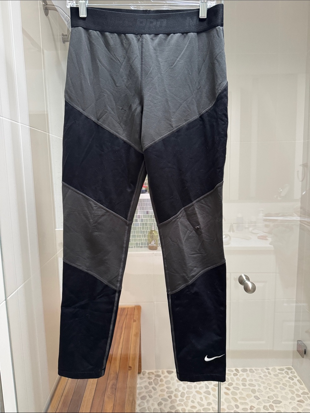 Nike women’s Black and Gray Chevron-Panel Pro Leggings